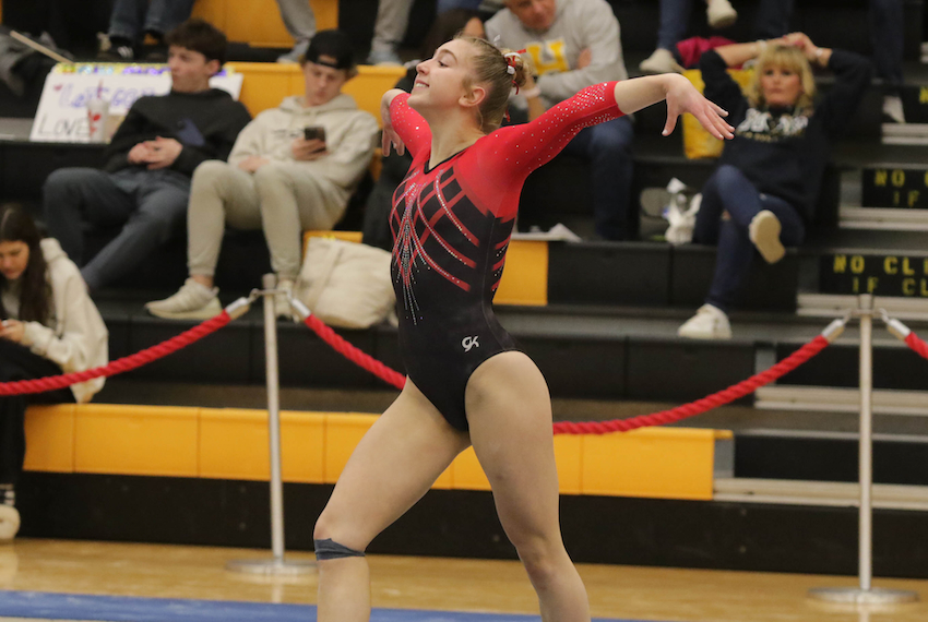 Haslett United’s Phoebe Elder competes on floor exercise during the Division 1 individual meet.
