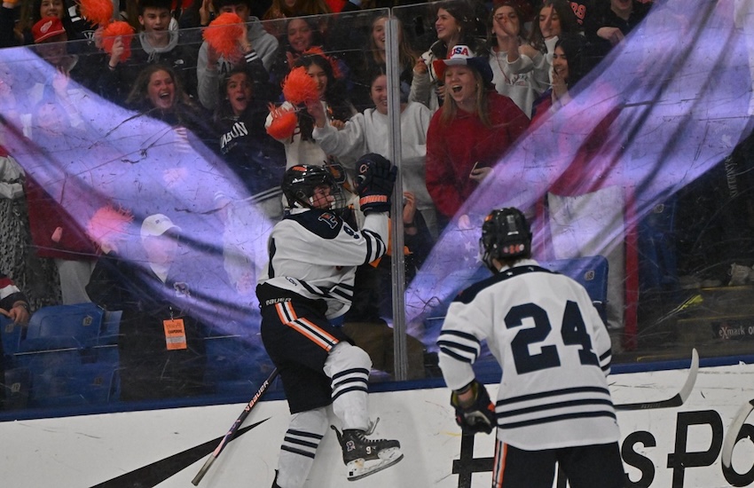 Flint Powers Catholic players and fans celebrate their first goal during a 3-0 Division 2 Semifinal win over Detroit U-D Jesuit (13-16) on Thursday.&nbsp;