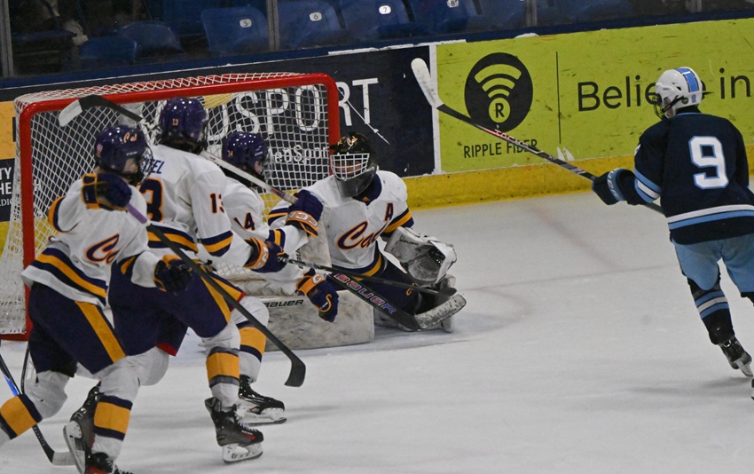 Livonia Stevenson’s Caden Mason scores with 4:12 left in the first period to tie his team’s Division 2 Semifinal with Caledonia (21-6-1) at 1-1 on Thursday. Bennett Eckerman and Nic Agar assisted on the goal, and Stevenson went on to win 3-2.