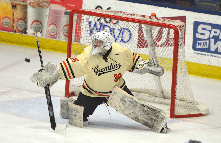 Houghton goalie Cooper Flachs makes one of 16 saves during his team’s shutout of Traverse Bay Reps (16-13-1) on Friday.