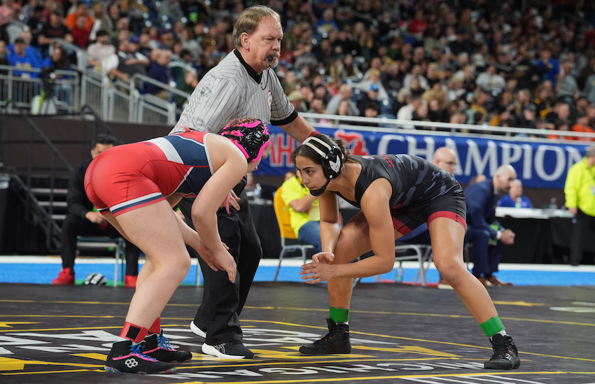 Romeo's Belicia Manuel, right, and Big Rapids' Aaliyah Langell prepare to face off. 