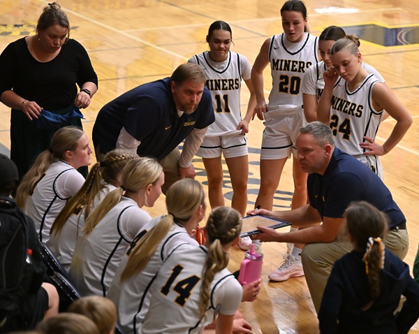 Negaunee's head coach Mike O'Donnell talks to his team during a timeout Dec. 19.