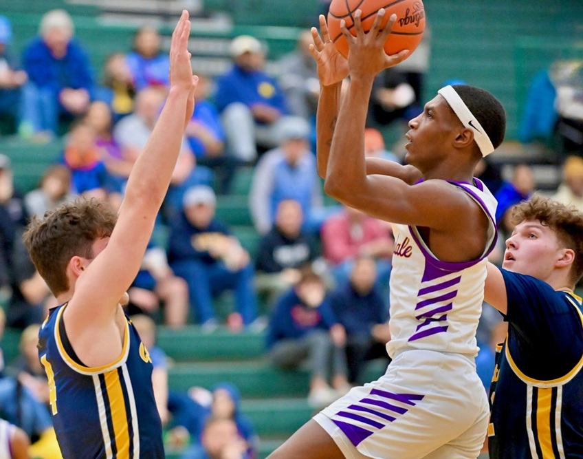 Avondale’s Jaidon Bourgeois goes to the basket during a District Final win over Clarkston. 