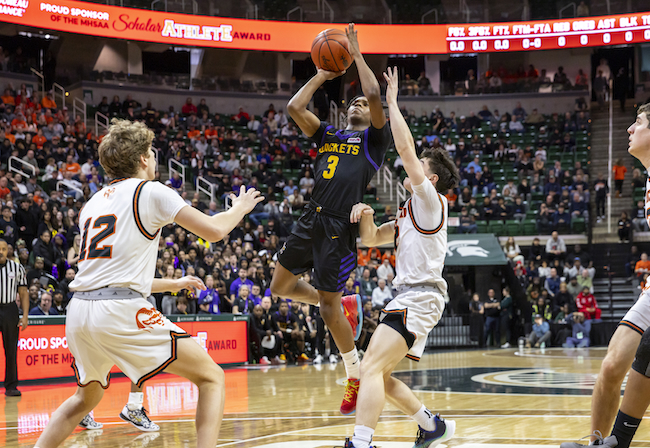 Avondale’s Qualaeb Ross (3) gets up a shot in the lane. 