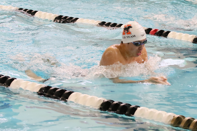 Northville’s Benjamin Hu swims to a fourth-place finish in the individual medley. 