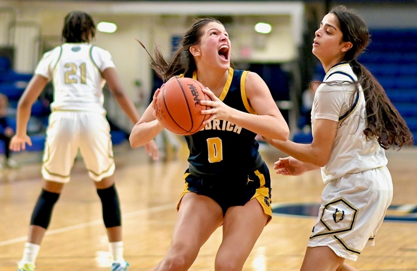 Goodrich’s Tanner Schramm (0) makes her move toward the basket during a Quarterfinal win over Detroit Country Day.