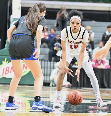 Mariah Sain (10) considers her options while directing the offense.&nbsp;