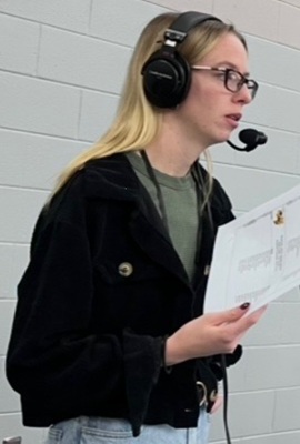 Martin describes the action for her audience. 