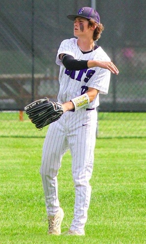 Brady Penny throws the ball back into the infield after making a catch in center field. 