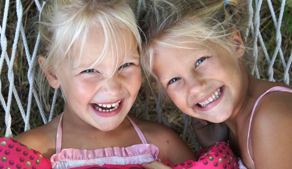 Laynie (left) and Maddie are all smiles for a much earlier photo.