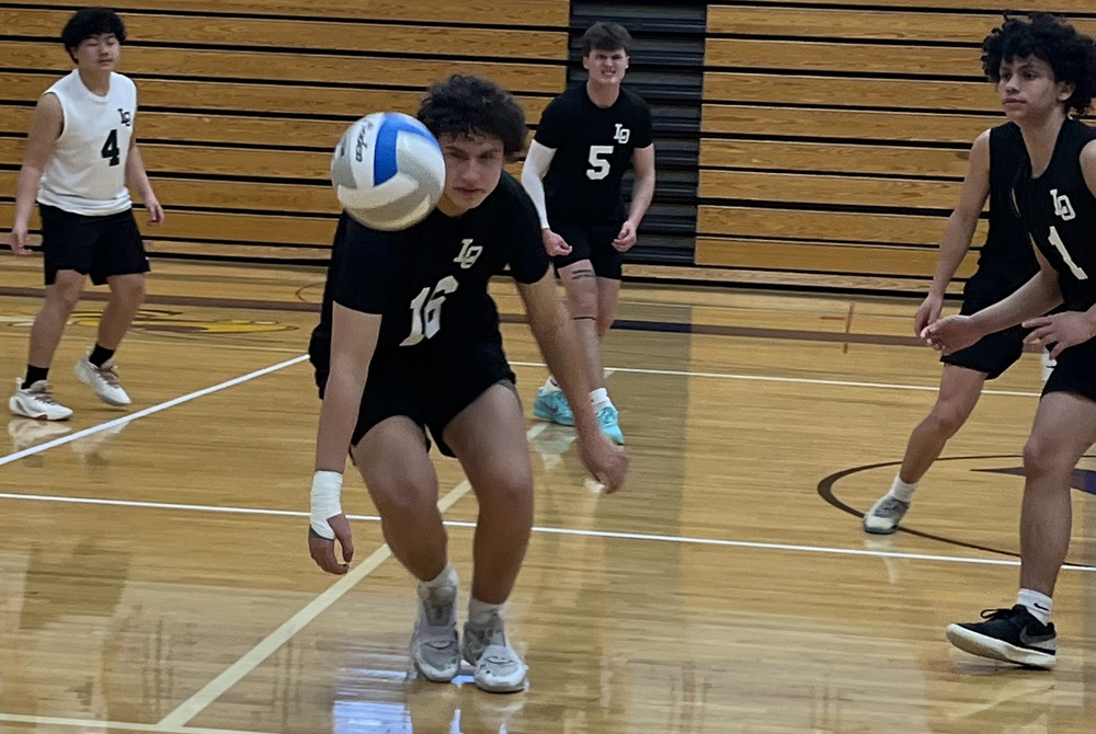Dragons junior Owen Dyer tracks down a loose ball.