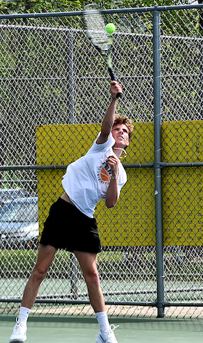 Iron Mountain’s Malakai Broersma connects during a volley. 