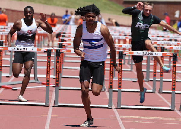 Detroit Catholic Central's Zacchaeus Brocks sprints toward the finish in the 110 hurdles.