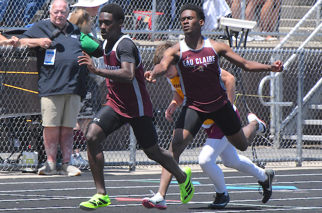 Eau Claire completes a handoff during one of its two relay championships. 