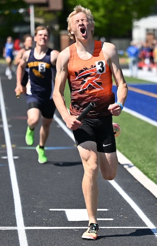 Rudyard's Steven Kirschner celebrates winning the 1,600 relay. 