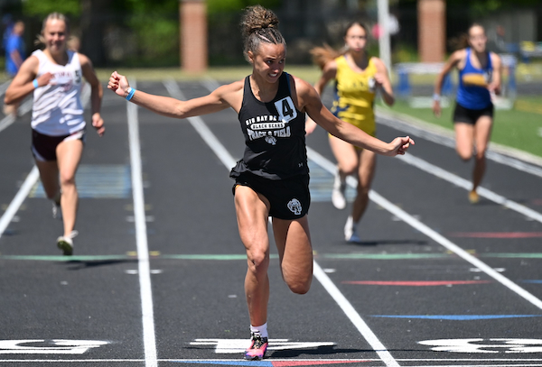 Big Bay De Noc's Destiny Bleau breaks the UPD3 Finals record in the 200 with a time of 26.01.