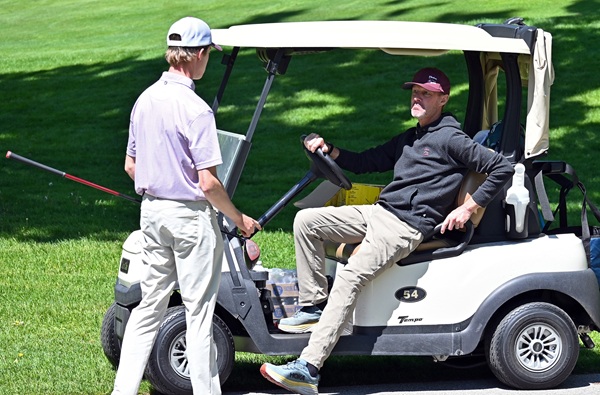Drenth confers with one of his golfers during the Regional. 