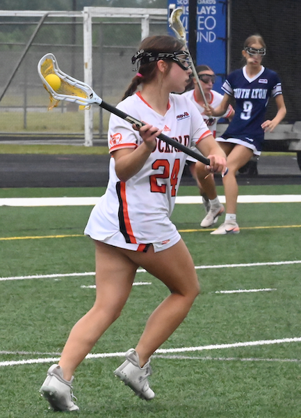 The Rams' Jordyn Coretti (24) looks to pass near the opposing goal. 