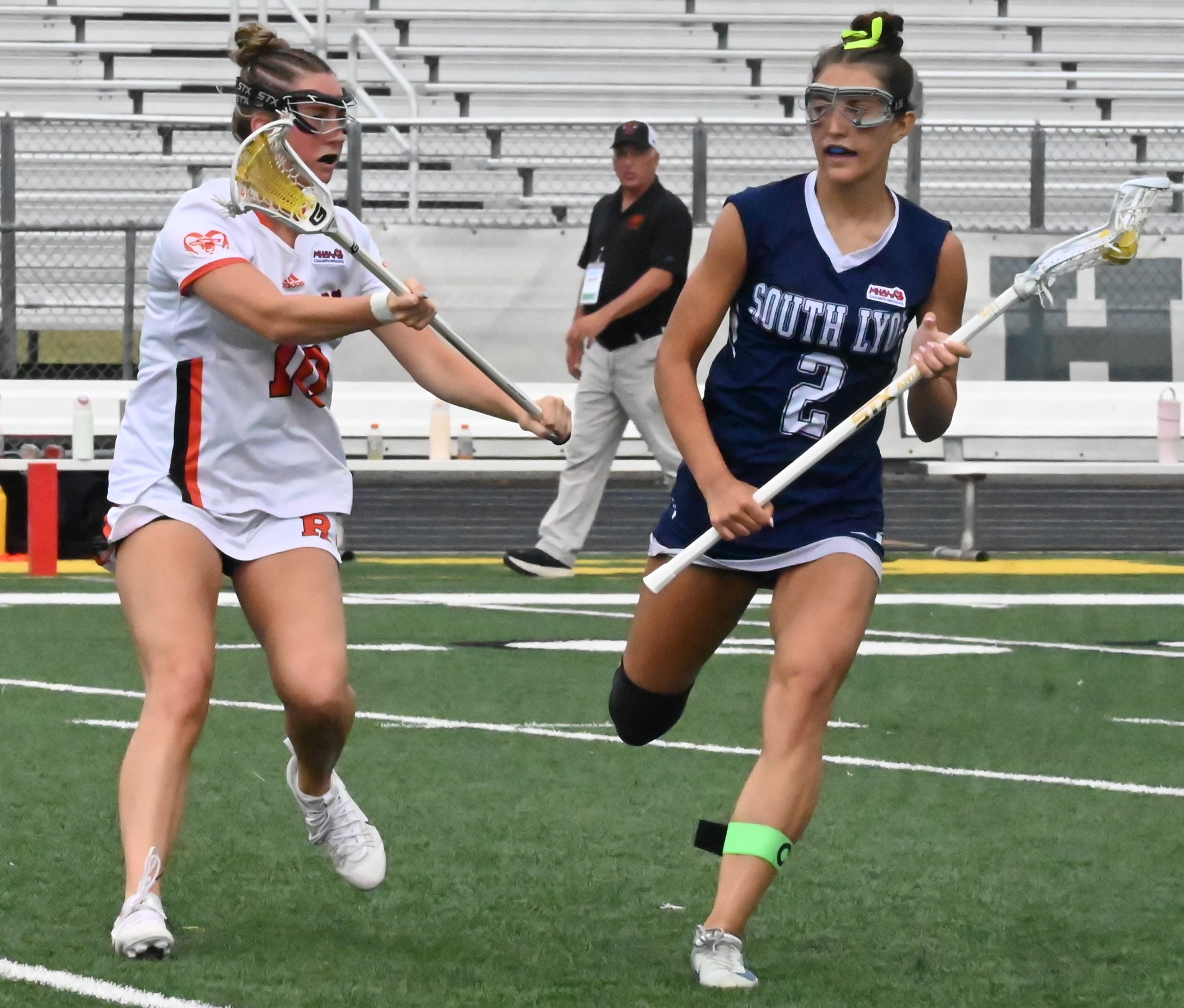South Lyon United's Shaelyn Perry (2) considers her optoins as Rockford's Lyla Vogt defends.&nbsp;