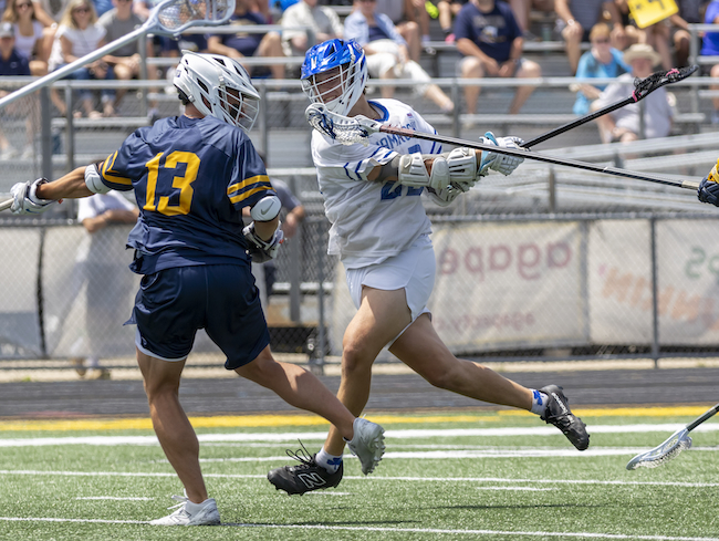 Kramer (22) follows through on a shot.
