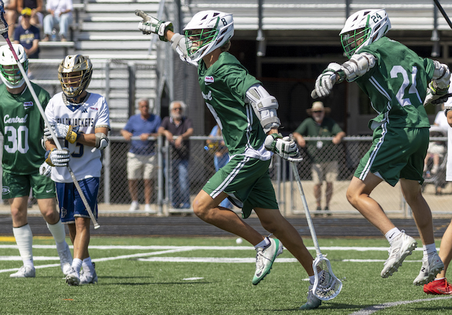 Forest Hills Central’s Blake Teliczan (8) and Elliott Fricano (24) celebrate a moment.