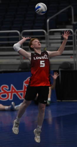 The Red Arrows’ Will Selent elevates during a serve. 