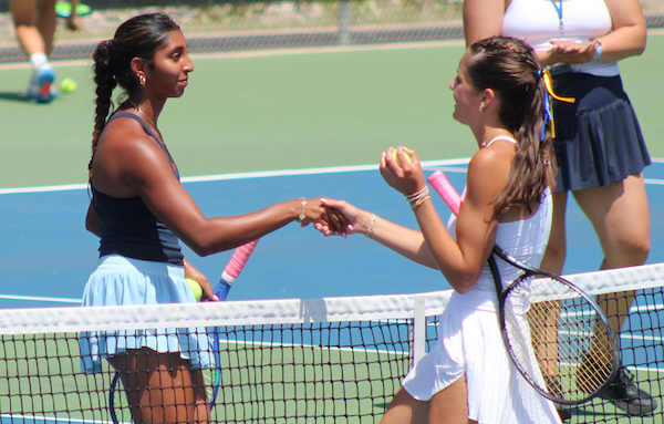 Country Day’s Karishma Vakhariya, left, and&nbsp;East Grand Rapids’ Farha Malviya shake hands after their title decider at No. 2 singles. 