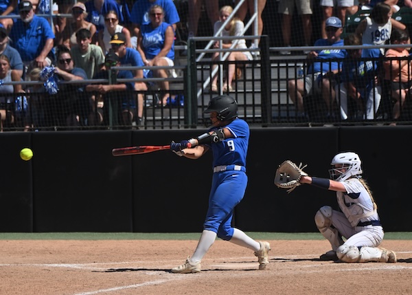 Taylor Nutt (9) drives a pitch for the Bulldogs.