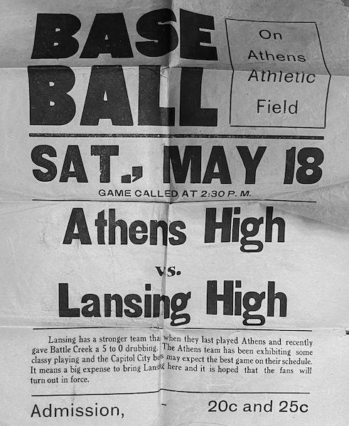 A sign advertises a matchup with Lansing that season. 