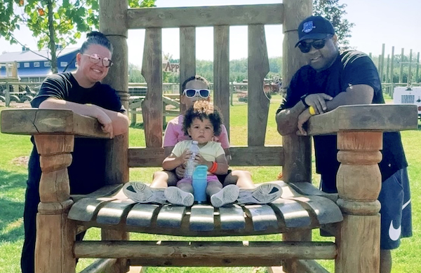 White poses with wife Kathleen and children Vincent and Riley. 