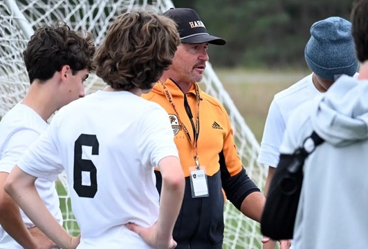 Harbor Springs coach Jeff Suffolk talks things over with his team. 