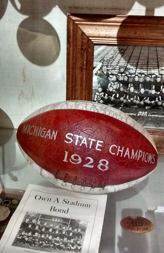 This display includes a photo of the 1928 state championship team and brochure for stadium bonds.
