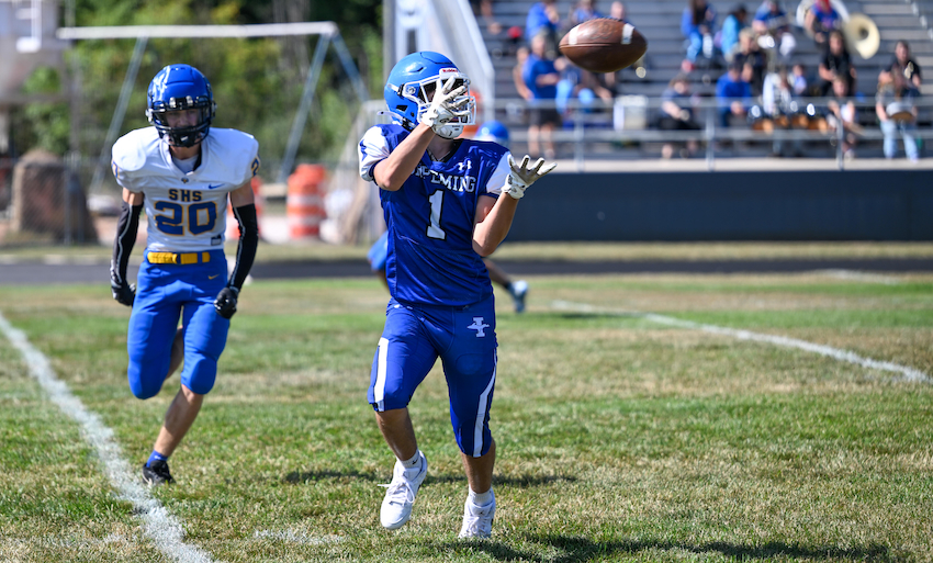 Ishpeming’s Donovan Snyder (1) pulls in a pass against Stephenson.