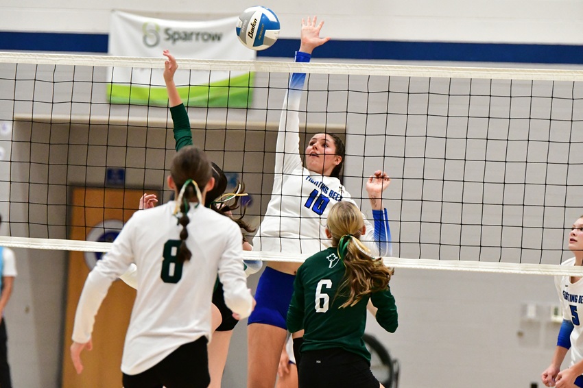 Bath’s Kyria Pairolero (10) elevates to get her hand on a ball against Portland St. Patrick.