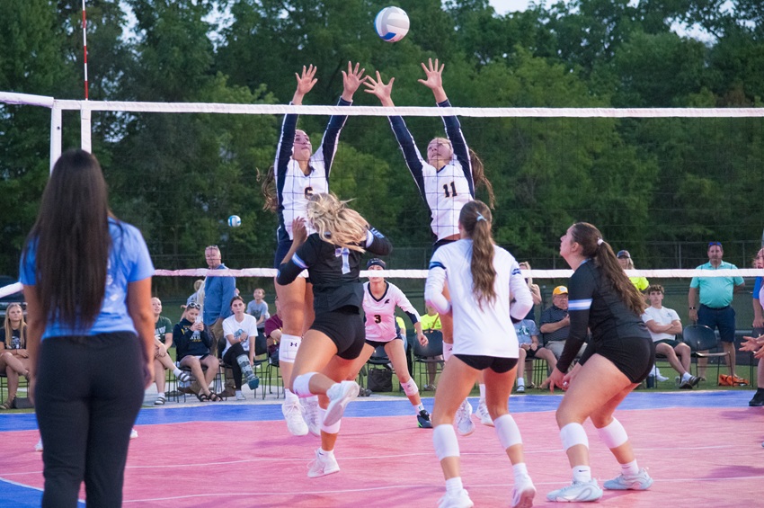 DeWitt and Lansing Catholic face off during the Cougars’ Volley Turf Takeover on Aug. 20. 