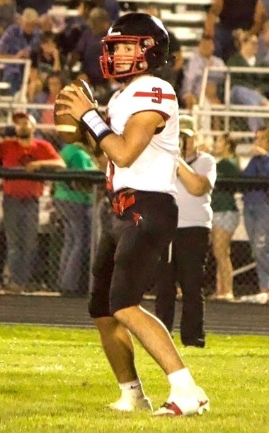 Coscione eyes his target before throwing a pass.