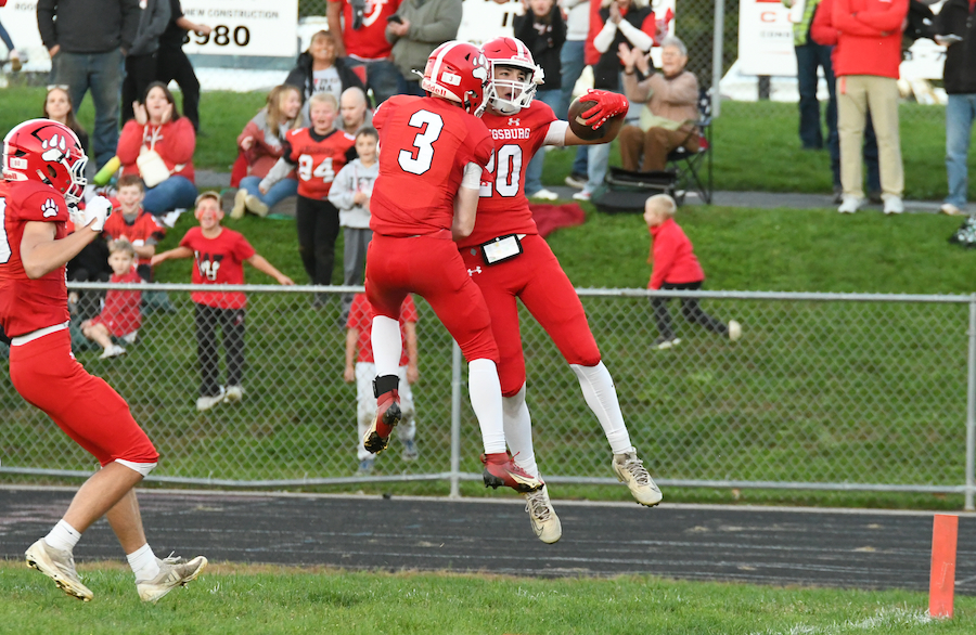 aingsburg players celebrate a touchdown during a 44-0 shut out of Bath. 
