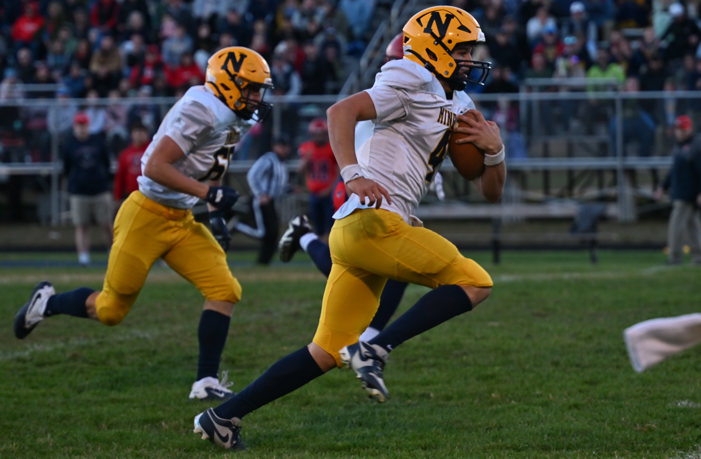 Negaunee's&nbsp;Kyle Waterman keeps the ball and carries it to within a few yards of the end zone. 