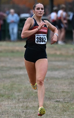Newberry's Abby Taylor crosses the finish line in first place at the Negaunee Invitational.