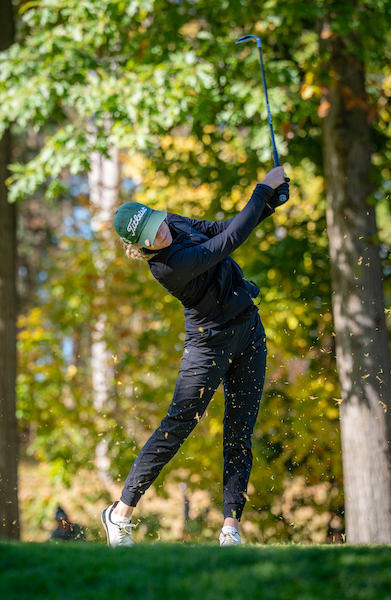 Muskegon Reeths-Puffer's Sophia McCollum follows through on an iron shot during her second round. 