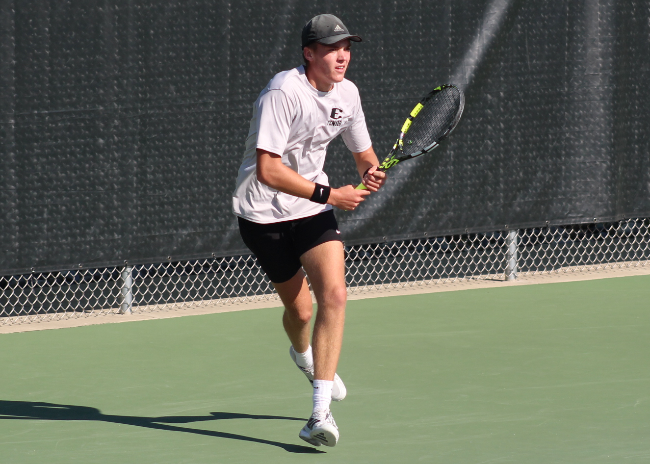 South Lyon East’s Mason Crosby moves into position during his No. 1 singles championship match.